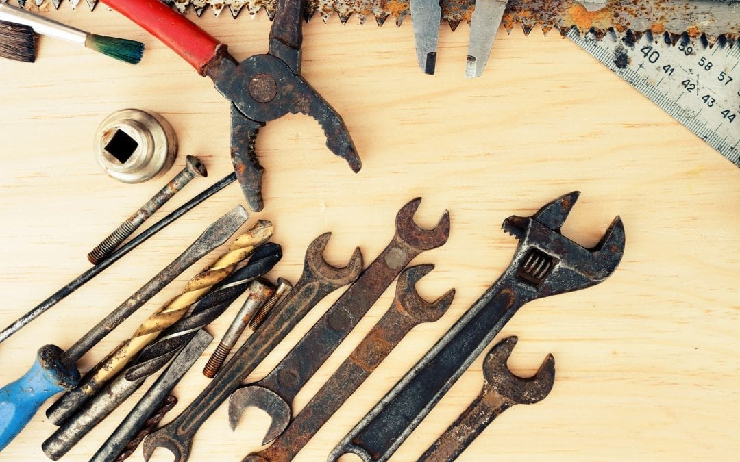 rusty tools on work bench 