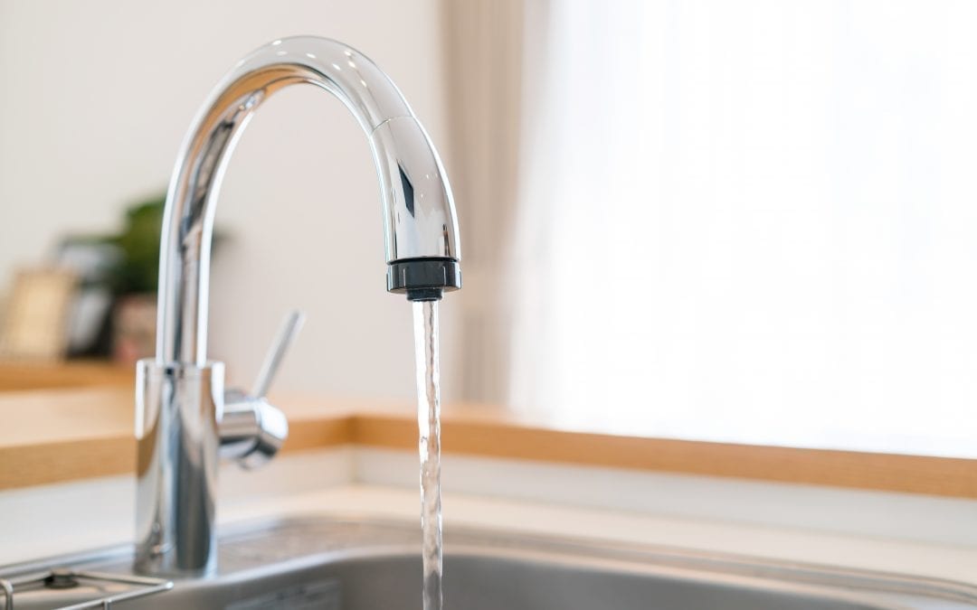 sink faucet with running water 