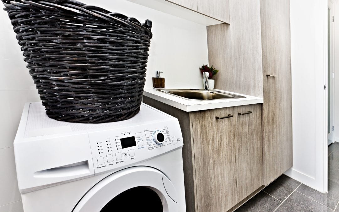 laundry basket on washer machine 
