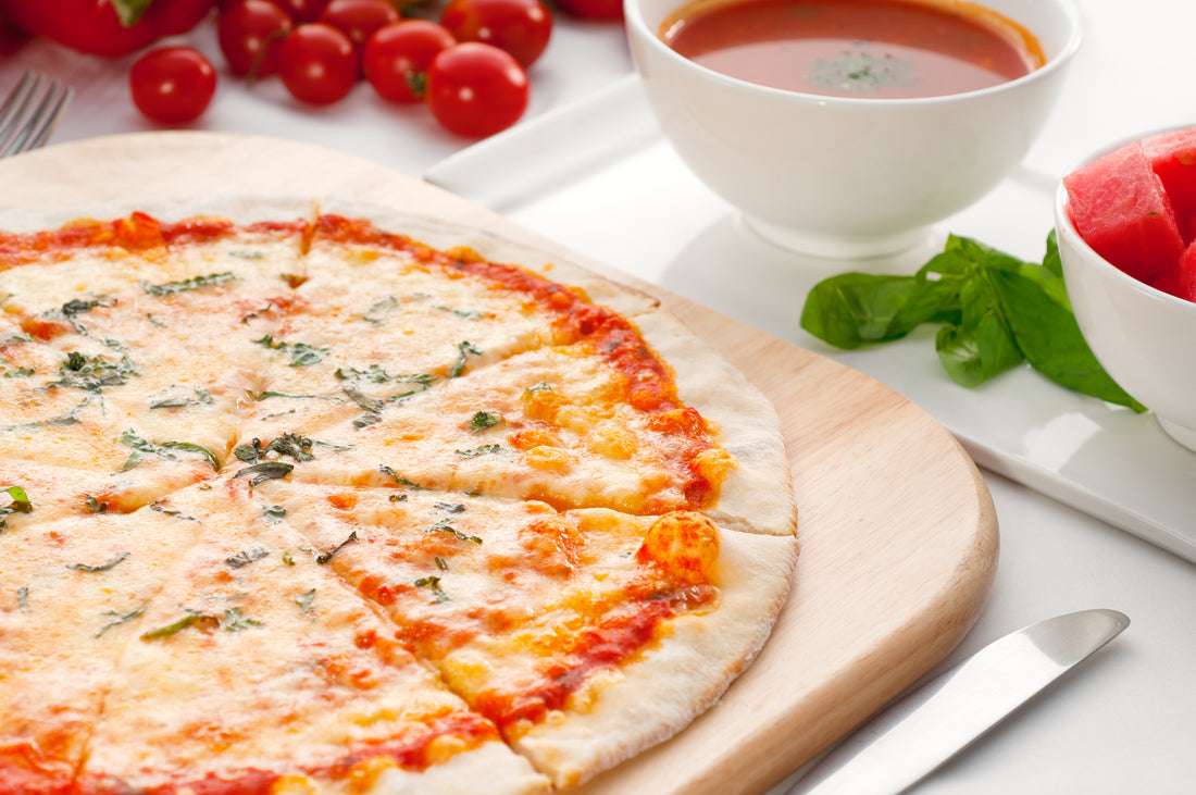 image of thin crust pizza, marinara sauce, and tomatoes