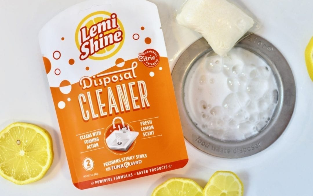 close up of disposal cleaner next to garbage disposal 