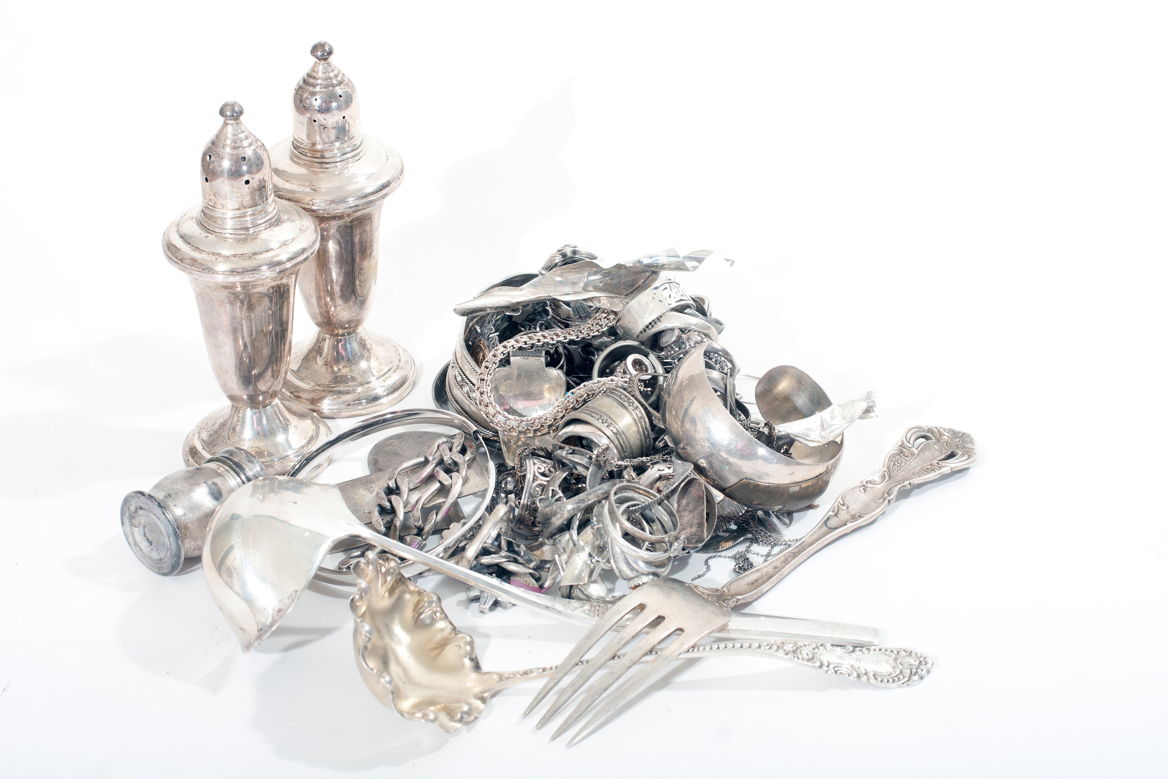 a variety of sterling silver items on display 